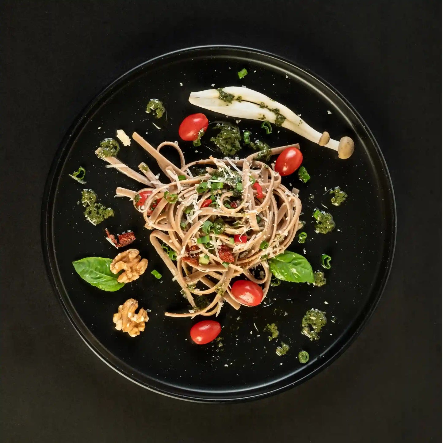 Plate of cooked Organic Einkorn Linguine with assorted ingredients